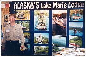 John Wilson at Alaska's Lake Marie Lodge booth, ISE Expo