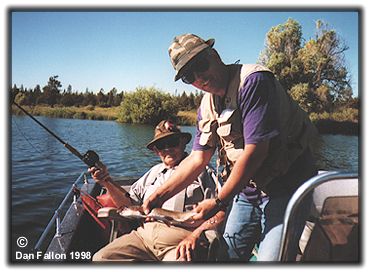 Dan Fallon (standing) and Walton Powell fishing on Fall River 1998